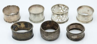 Seven various Victorian and later hallmarked silver napkin rings, weight 129g