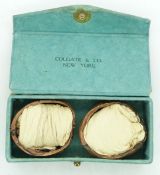 A pair of early 19thC Limerick 'chicken skin' gloves of pale yellow leather as originally folded