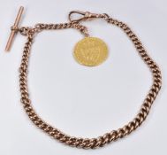 A 9ct rose gold graduated Albert (38g) with a 1789 guinea fob (8g)