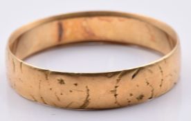 An 18ct gold wedding band/ ring, Birmingham 1906, 4.4g, size V