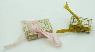 Two 19thC Indian Madras ware ivory pin cushions in the form of books, largest 4.5 x 3cm