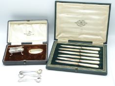A set of six hallmarked silver and mother-of-pearl fruit knives, a cased salt and three spoons,