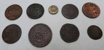 Five 18thC and early 19thC halfpenny tokens including St Helena and Newgate, together with a penny
