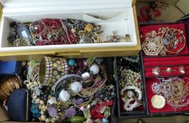 A collection of costume jewellery including silver earrings set with a cameo, silver necklace,