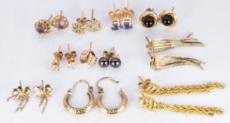 A collection of 9ct gold earrings including rope twist, amethyst set tri-coloured, pearls etc, 10g
