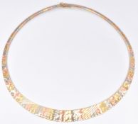 A 14k tri-coloured textured necklace, 25g