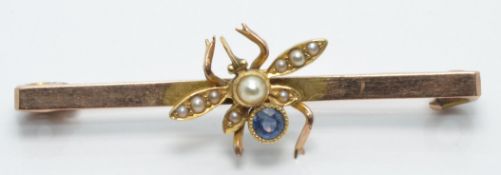 Edwardian brooch set with a sapphire and seed pearls in the form of a fly, length 3.5cm, 3.6g