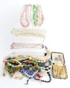 A collection of beaded necklaces including crystal, rose quartz, pearls, vintage box etc