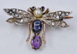 Victorian brooch in the form of a dragonfly set with a pearl, oval cut sapphire, oval cut
