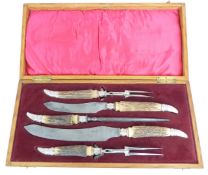 Edward VII hallmarked silver mounted carving set with antler handles, in fitted oak case,