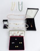 Two pearl necklaces, ivory necklace, glass necklaces and pearl earrings