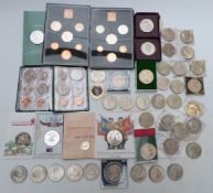 A collection of commemorative £5 coins and crowns, some UK proof sets etc