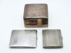 Hallmarked silver cigarette box, Chester, and two hallmarked silver engine turned cigarette cases,