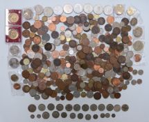 A collection of UK and overseas coinage including approximately 194g of mixed silver and some