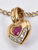 An 18ct gold pendant set with a synthetic ruby and diamonds (1.7g) on a 9ct gold chain (2.6g)