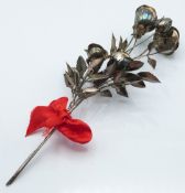 White metal bunch of roses comprising four open flowers and a part open bud, marked to stems 925,