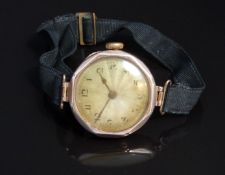 Rolex 9ct gold ladies wristwatch with gold hands, black Arabic numerals, engine turned silver dial