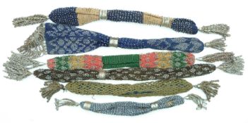 Six 19thC embroidery, beadwork, cut steel purses including misers', some with cut steel/filigree