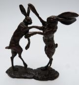 Paul Jenkins bronze study of boxing hares, signed to base, height 12cm