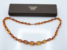 A pressed amber necklace
