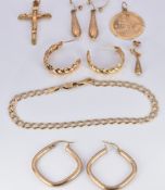 A group of 9ct gold jewellery including St Christopher, crucifix, three pairs of earrings and a