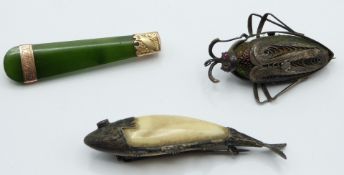 A silver brooch set with a beetle with ruby eyes, nephrite jade brooch with yellow metal mounts
