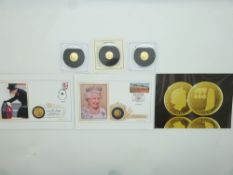 Two Tristan da Cunha 9ct gold coins, each 1g, together with a 22ct proof gold Royal Coat of Arms