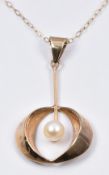 WITHDRAWN A 9ct gold pendant set with a pearl and chain, 1.6g