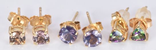 Three pairs of 9ct gold earrings set with mystic topaz, blueberry quartz and colour change garnet