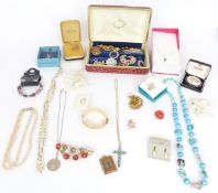 A collection of costumer jewellery including vintage brooches, silver cat brooch, silver necklace