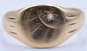 A 9ct gold signet ring set with paste, 4.5g, size V/W