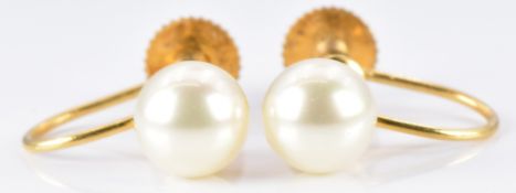 A pair of 9ct gold earrings set with faux pearls
