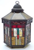 A stained and leaded glass hexagonal light shade, H33 x W23cm