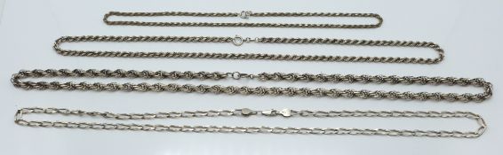 Four silver necklaces including curb link and rope twist, 117g