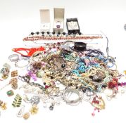 A collection of beads, vintage brooches, Sphinx pendant, filigree butterfly etc