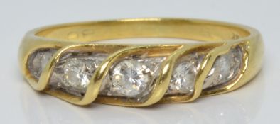A 14k gold ring set with five diamonds, 3.0g, size M