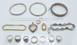 A silver and labradorite bracelet, three silver bangles, six silver rings, two silver heart