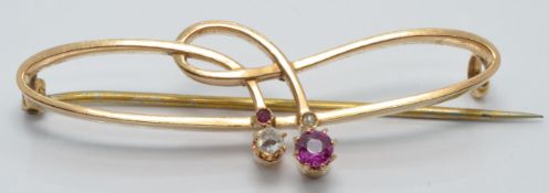 Late Victorian/ early Edwardian 15ct gold brooch set with rose cut diamonds and rubies, 1 x 4.5cm,