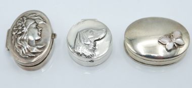 Three various trinket boxes, one embossed with a dog and marked 925 and with import silver