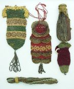 Six 19thC cut steel, leather and embroidery purses, longest 19cm