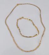 A 9ct gold tri-coloured necklace and matching bracelet, 4.2g