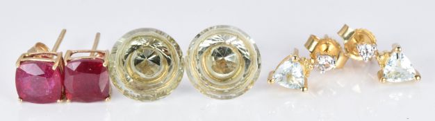 Three pairs of 9ct gold earrings set with rubellite, zircons and topaz