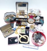 A collection of costume jewellery including beads, brooches, silver necklace, vintage earrings,