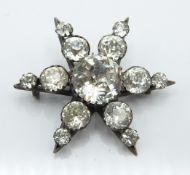 Victorian hallmarked silver star brooch set with foiled paste, Birmingham 1892, diameter 3.5cm