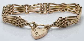 A 9ct gold gate bracelet with heart padlock, 15g