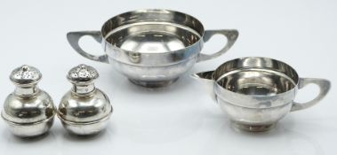 Pair of George V hallmarked silver peppers, London 1911 maker's marks indistinct, height 7cm, weight