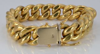 An 18ct gold curb link bracelet, length 20cm, 57.1g