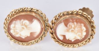 A pair of 9ct gold earrings set with cameos, 3.7g