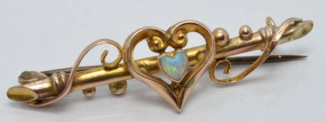 Edwardian 9ct gold brooch set with a heart cut opal cabochon in original Skinner, London box, 1 x