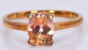 A 9ct gold ring set with a 'twilight topaz', 1.8g, size M/N